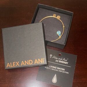 Alex and Ani Gold Bracelet with Teardrop Blue Charm